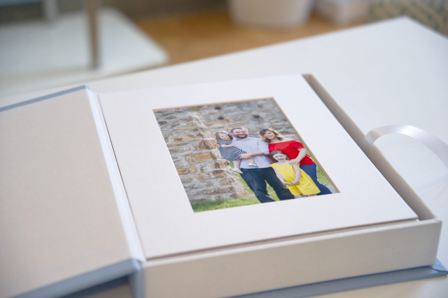 Matted photos in a collection box